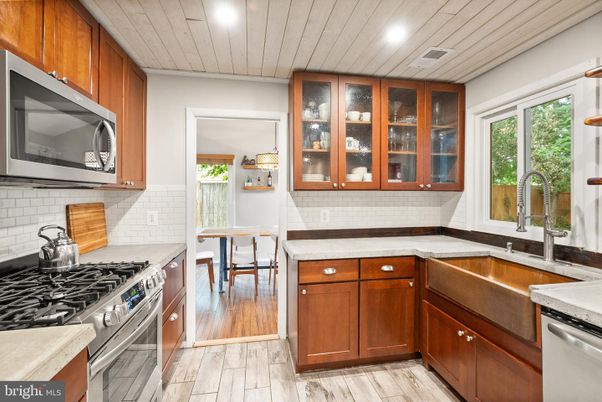 Dining room, Interior, Kitchen, Recessed Lighting, Stainless Steel Appliances, Wood Texture Flooring