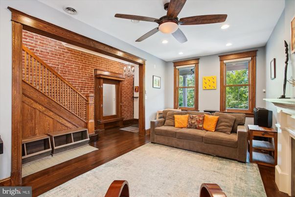 Fireplace, Interior, Living room, Recessed Lighting, Stone Walls, Wood Texture Flooring