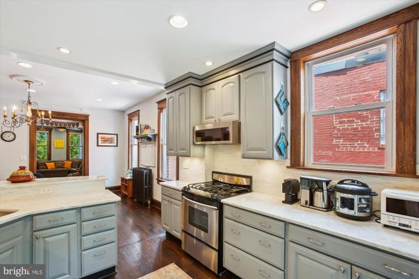Chandelier, Interior, Kitchen, Recessed Lighting, Stainless Steel Appliances, Wood Texture Flooring