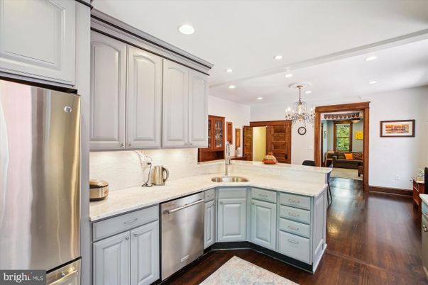 Chandelier, Interior, Kitchen, Recessed Lighting, Stainless Steel Appliances, Wood Texture Flooring