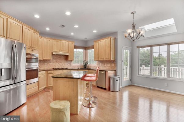 Chandelier, Interior, Kitchen, Recessed Lighting, Stainless Steel Appliances, Wood Texture Flooring