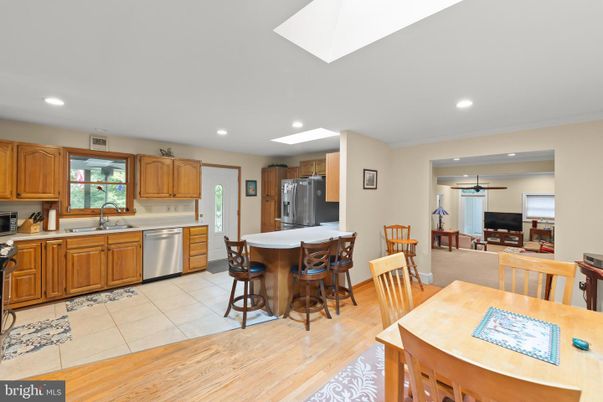 Dining room, Interior, Kitchen, Recessed Lighting, Stainless Steel Appliances, Wood Texture Flooring
