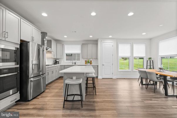 Dining room, Interior, Kitchen, Recessed Lighting, Stainless Steel Appliances, Wood Texture Flooring