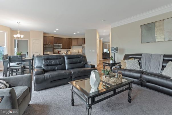 Chandelier, Dining room, Interior, Kitchen, Living room, Recessed Lighting, Stainless Steel Appliances, Wood Texture Flooring