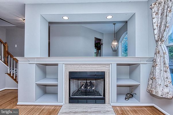 Fireplace, Interior, Pendant Lights, Recessed Lighting, Wood Texture Flooring