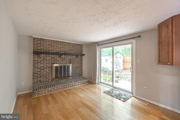 Empty room, Fireplace, Interior, Stone Walls, Wood Texture Flooring