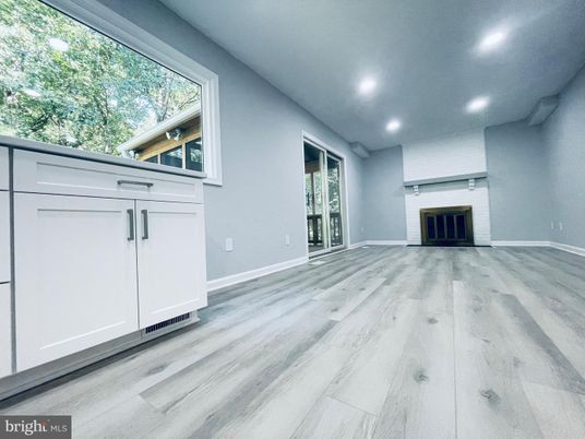 Empty room, Fireplace, Interior, Recessed Lighting, Wood Texture Flooring