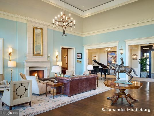 Chandelier, Fireplace, Interior, Living room, Piano, Recessed Lighting, Wood Texture Flooring