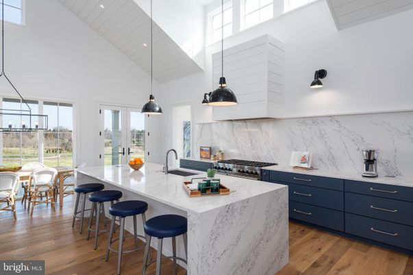 Interior, Kitchen, Marble Walls, Pendant Lights, Recessed Lighting, Wood Texture Flooring