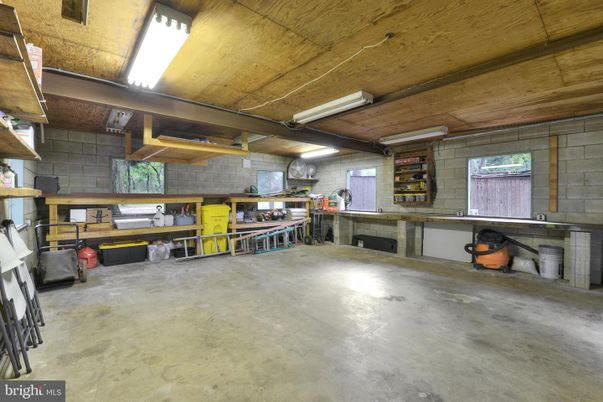 Garage, Interior, Stone Walls, Wooden Beams