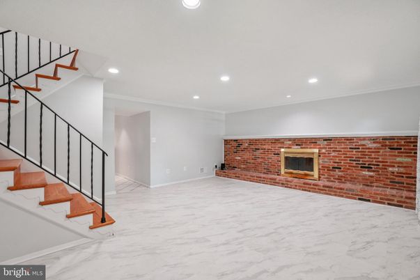 Empty room, Fireplace, Interior, Marble, Recessed Lighting, Stone Walls