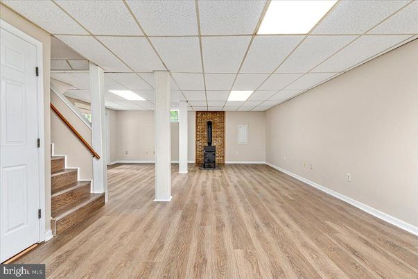 Empty room, Interior, Recessed Lighting, Stone Walls, Wood Texture Flooring