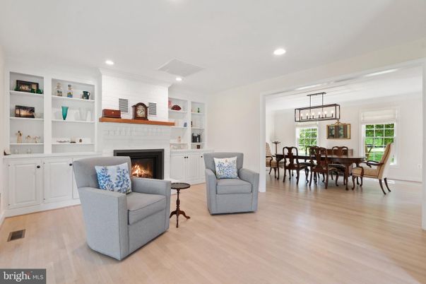 Dining room, Fireplace, Interior, Living room, Pendant Lights, Recessed Lighting, Wood Texture Flooring