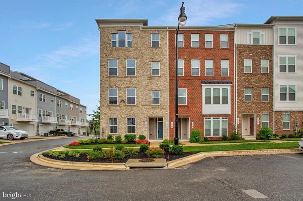 Exterior, Facade, Brick Facade, Condo Building