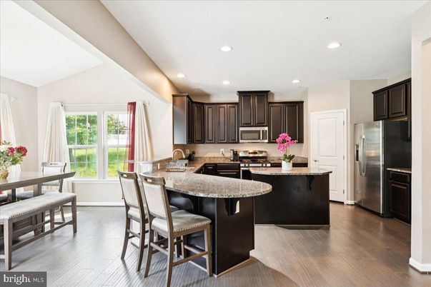 Dining room, Interior, Kitchen, Recessed Lighting, Stainless Steel Appliances, Wood Texture Flooring