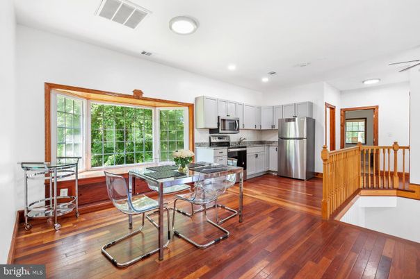 Dining room, Interior, Kitchen, Recessed Lighting, Stainless Steel Appliances, Wood Texture Flooring