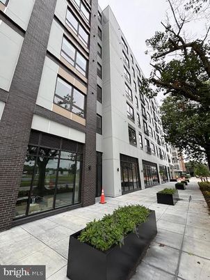 Exterior, Facade, Brick Facade, Condo Building