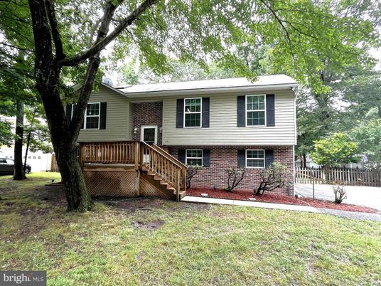 Exterior, Facade, Brick Facade, Raised Ranch