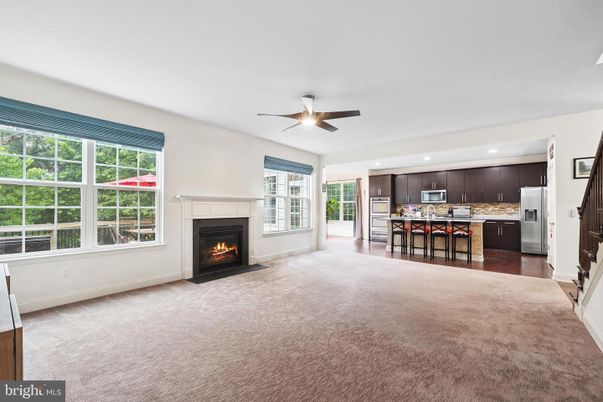 Empty room, Fireplace, Interior, Kitchen, Recessed Lighting, Wood Texture Flooring