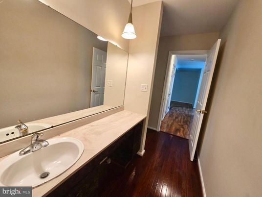 Bathroom, Dual Sink Vanities, Interior, Pendant Lights, Wood Texture Flooring