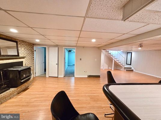 Fireplace, Interior, Recessed Lighting, Stone Walls, Wood Texture Flooring