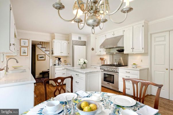 Chandelier, Dining room, Interior, Kitchen, Stainless Steel Appliances, Wood Texture Flooring