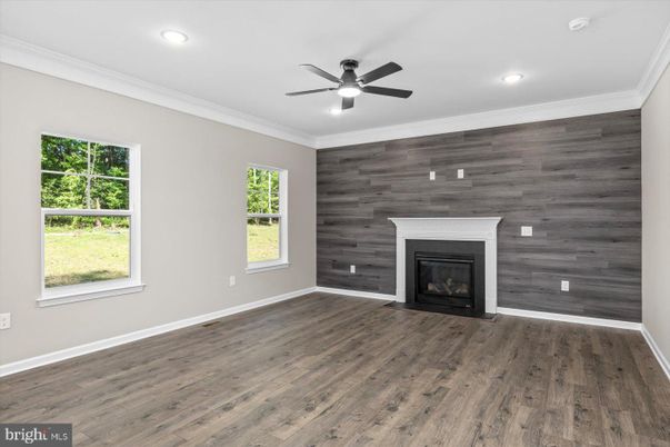Empty room, Fireplace, Interior, Recessed Lighting, Wood Texture Flooring, Wooden Walls