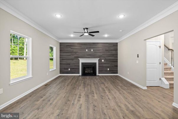 Empty room, Fireplace, Interior, Recessed Lighting, Wood Texture Flooring, Wooden Walls