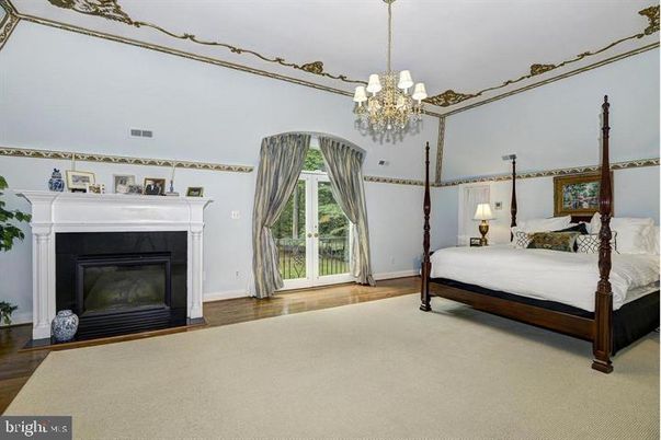 Bedroom, Chandelier, Fireplace, Interior, Wood Texture Flooring