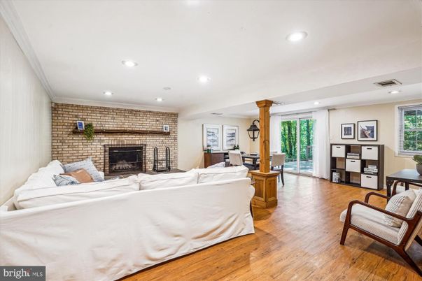 Bedroom, Fireplace, Interior, Recessed Lighting, Stone Walls, Wood Texture Flooring