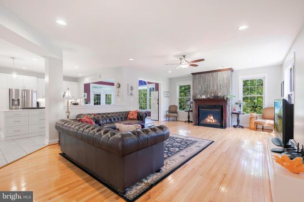 Fireplace, Interior, Kitchen, Living room, Recessed Lighting, Wood Texture Flooring