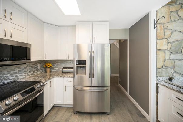Interior, Kitchen, Stainless Steel Appliances, Stone Walls, Wood Texture Flooring