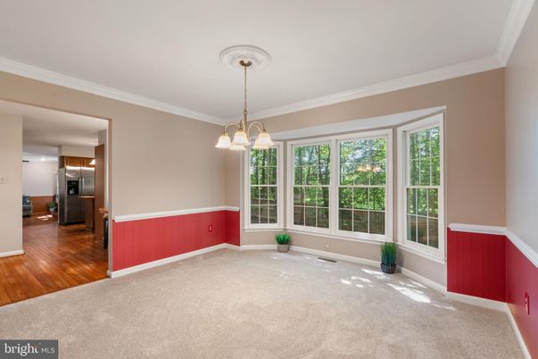 Empty room, Interior, Pendant Lights, Stainless Steel Appliances, Wood Texture Flooring