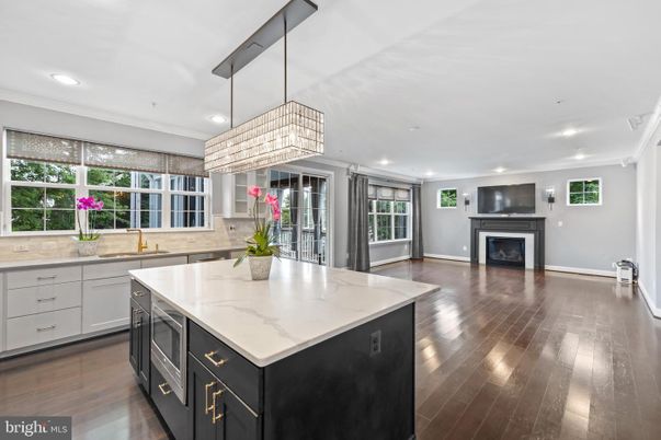 Chandelier, Fireplace, Interior, Kitchen, Recessed Lighting, Wood Texture Flooring