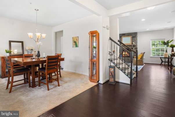 Chandelier, Dining room, Fireplace, Interior, Recessed Lighting, Wood Texture Flooring