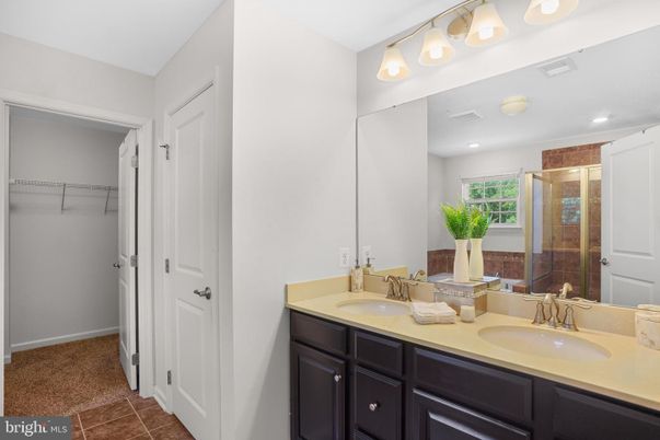 Bathroom, Dual Sink Vanities, Glass Shower, Interior, Recessed Lighting, Walk-in Closets