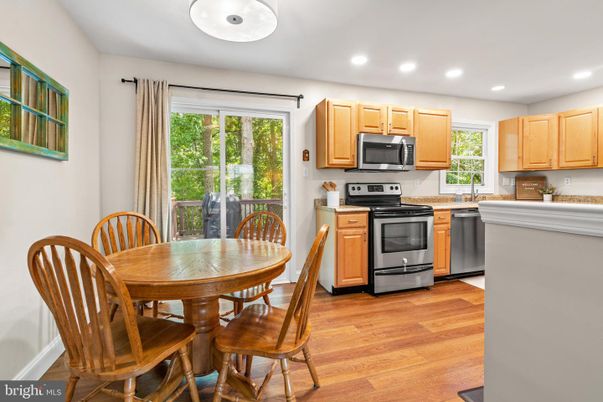 Dining room, Interior, Kitchen, Recessed Lighting, Stainless Steel Appliances, Wood Texture Flooring