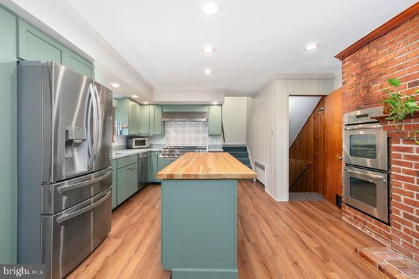 Interior, Kitchen, Recessed Lighting, Stainless Steel Appliances, Stone Walls, Wood Texture Flooring