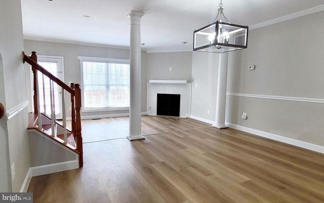 Empty room, Fireplace, Interior, Pendant Lights, Wood Texture Flooring