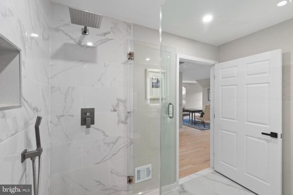Bathroom, Glass Shower, Interior, Marble, Marble Walls, Recessed Lighting, Wood Texture Flooring