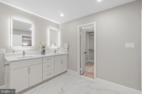 Bathroom, Dual Sink Vanities, Interior, Marble, Recessed Lighting, Wood Texture Flooring