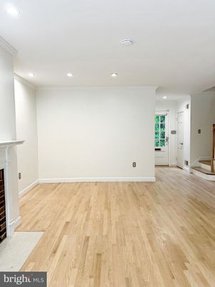 Empty room, Fireplace, Interior, Recessed Lighting, Wood Texture Flooring