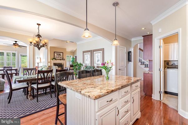 Chandelier, Dining room, Fireplace, Interior, Kitchen, Pendant Lights, Recessed Lighting, Wood Texture Flooring