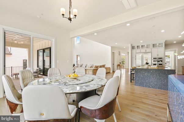 Chandelier, Dining room, Interior, Kitchen, Recessed Lighting, Stainless Steel Appliances, Wood Texture Flooring