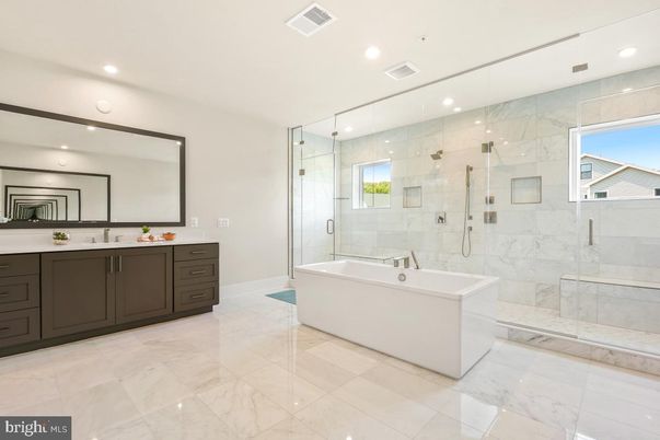 Bathroom, Dual Sink Vanities, Free Standing Baths, Glass Shower, Interior, Marble, Marble Walls, Recessed Lighting