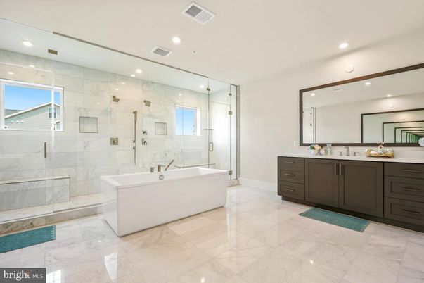 Bathroom, Dual Sink Vanities, Free Standing Baths, Glass Shower, Interior, Marble, Marble Walls, Recessed Lighting