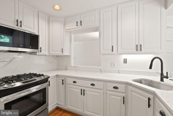 Interior, Kitchen, Marble Walls, Recessed Lighting, Wood Texture Flooring
