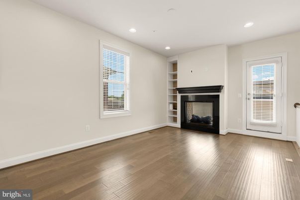 Empty room, Fireplace, Interior, Recessed Lighting, Wood Texture Flooring