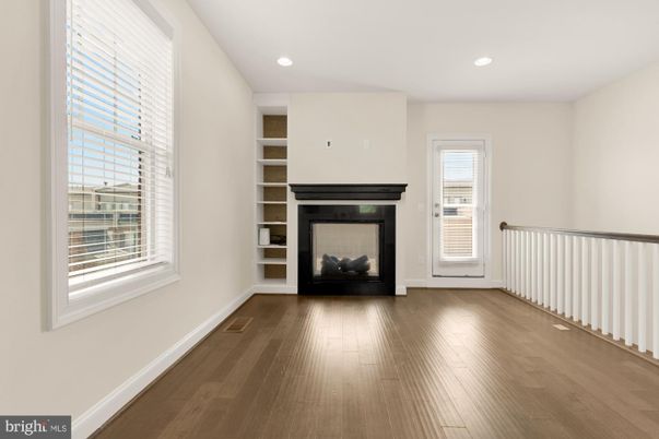 Empty room, Fireplace, Interior, Recessed Lighting, Wood Texture Flooring