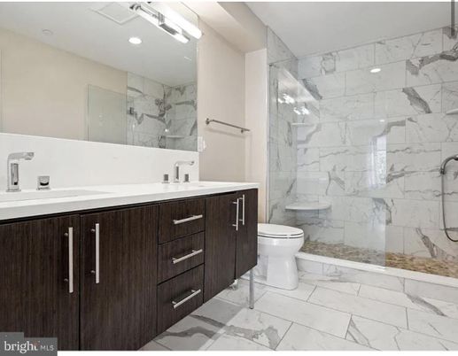 Bathroom, Dual Sink Vanities, Glass Shower, Interior, Marble, Marble Walls, Recessed Lighting